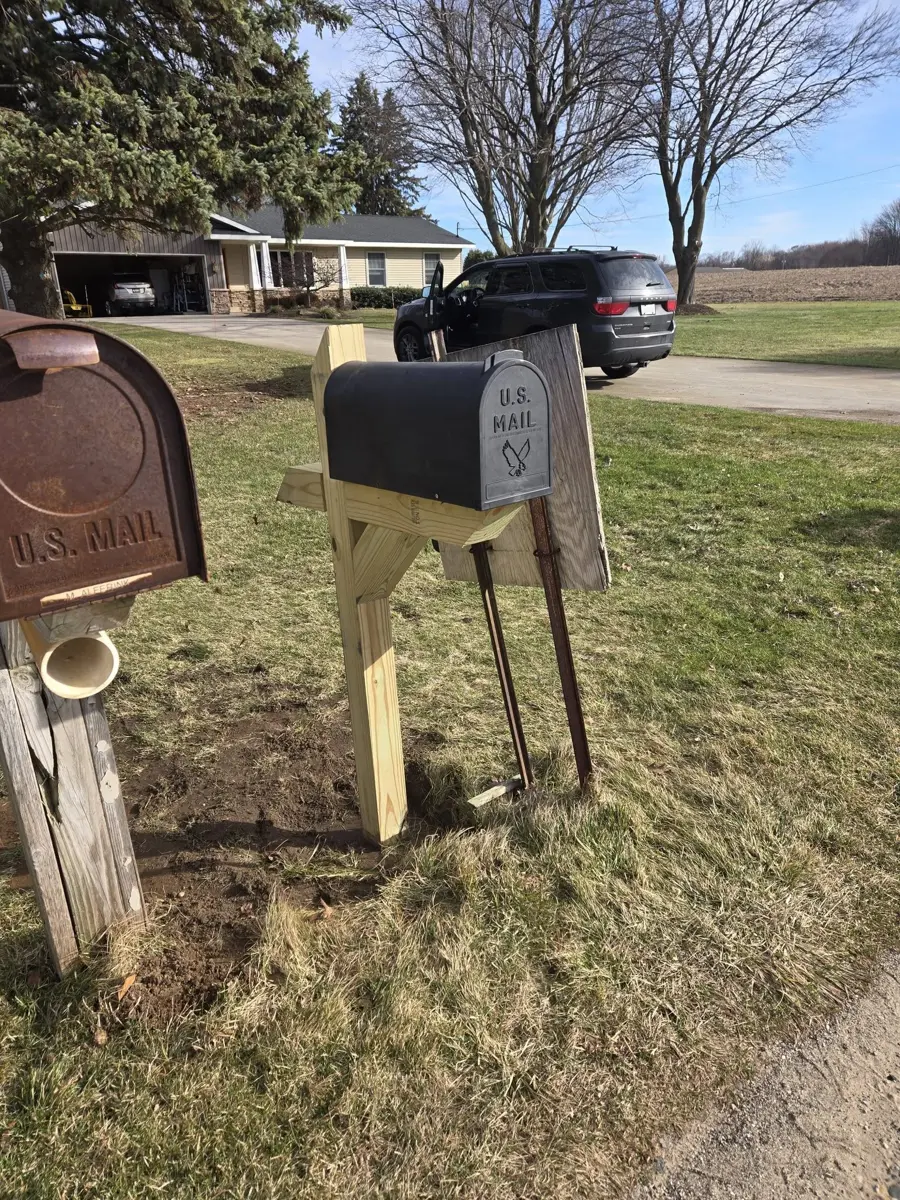 After: sturdy new mailbox post installed