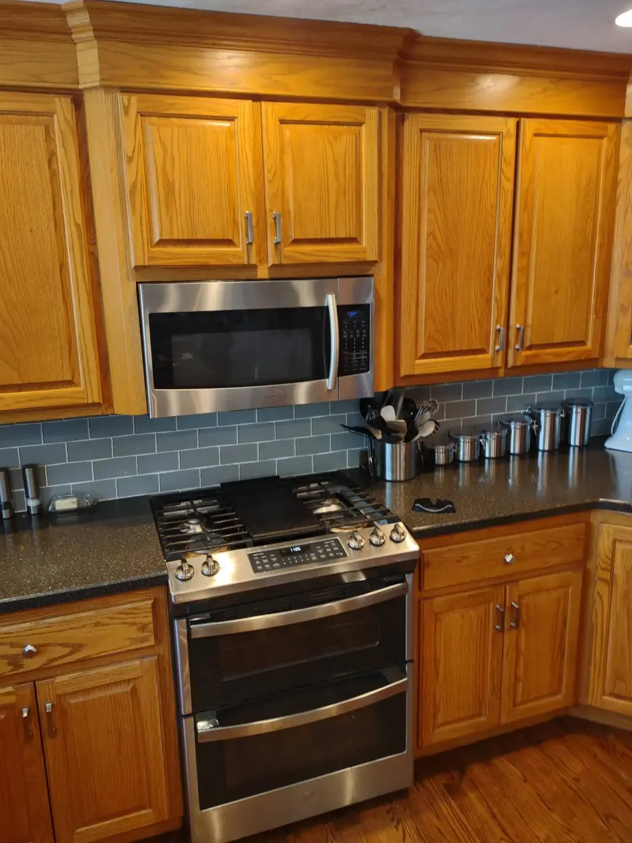 Before: honey oak kitchen cabinets